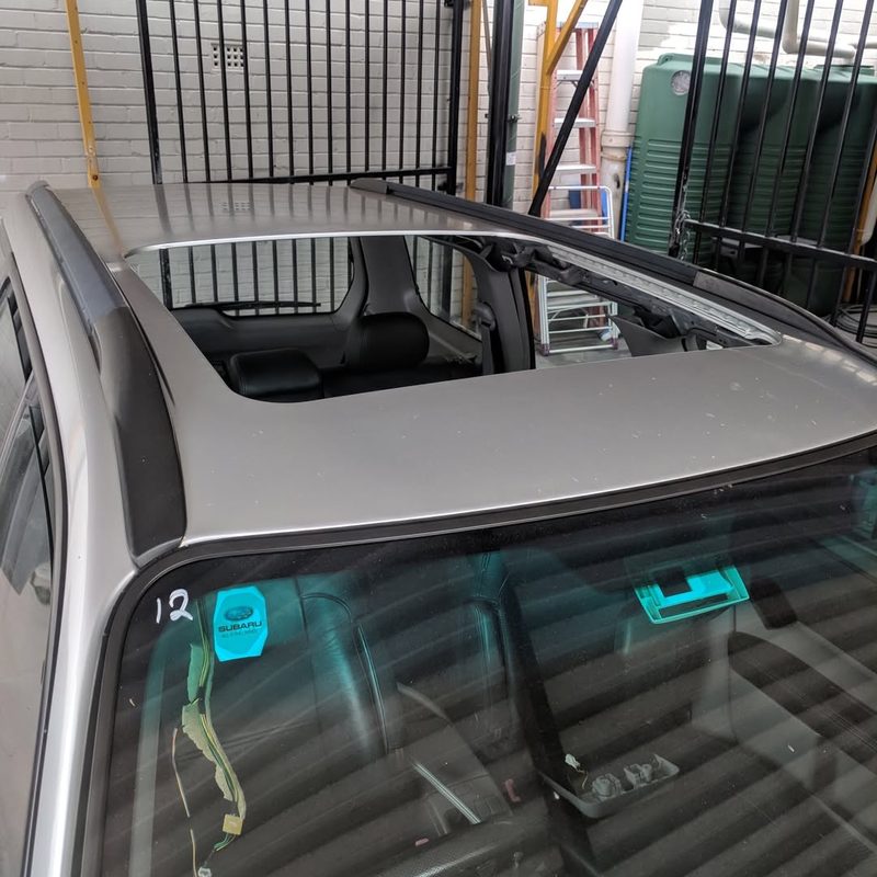 Subaru — sunroof assembly out